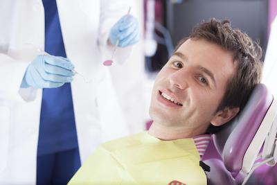 Man getting ready for porcelain veneers in Royal Oak, MI