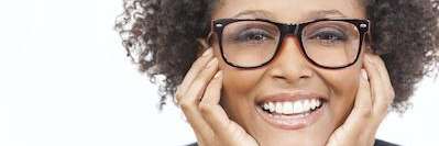 Woman with perfect teeth after whitening in Royal Oak, MI