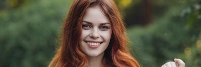 Lady smiling after dental treatment in Royal Oak, MI