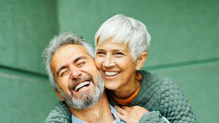Couple smiling after professional Teeth Whitening at Family Dentistry of Royal Oak