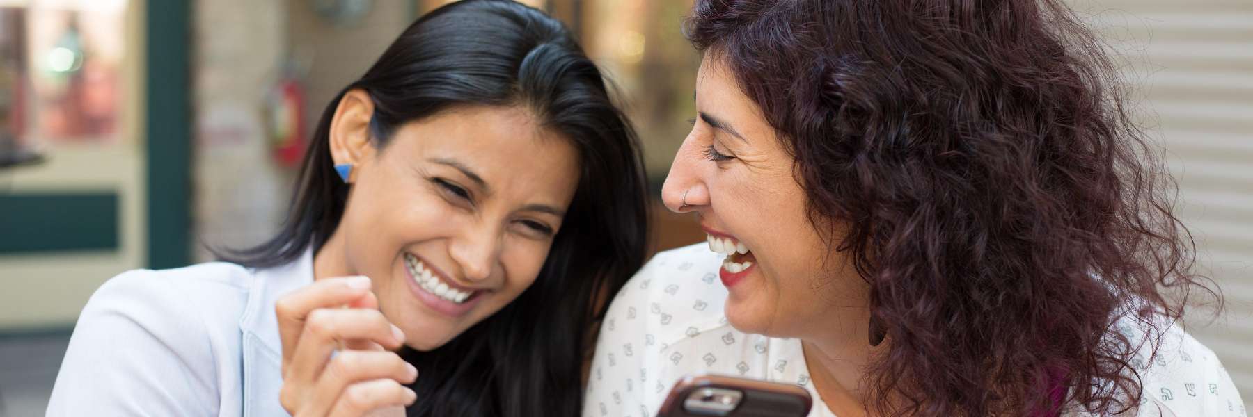 Ladies smiling after dental examination in Royal Oak, MI