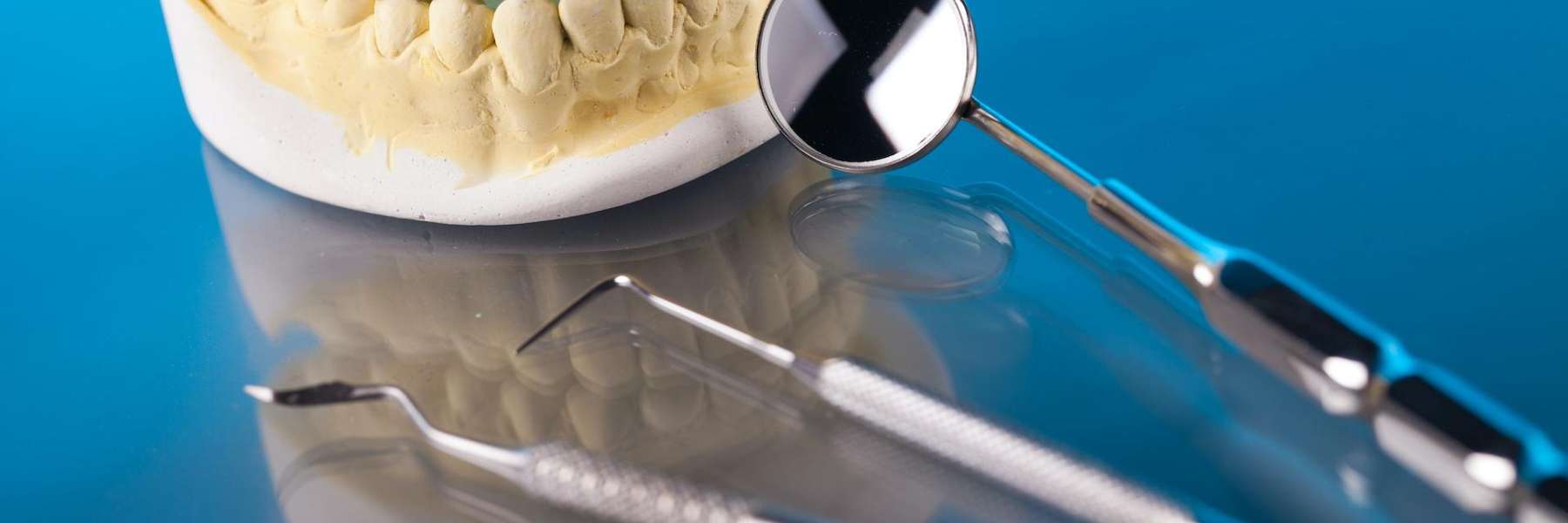 An Illustration of a Dental Crown and dental equipment in Royal Oak