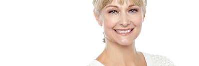 Lady smiling after Gum Disease treatment in Royal Oak, MI